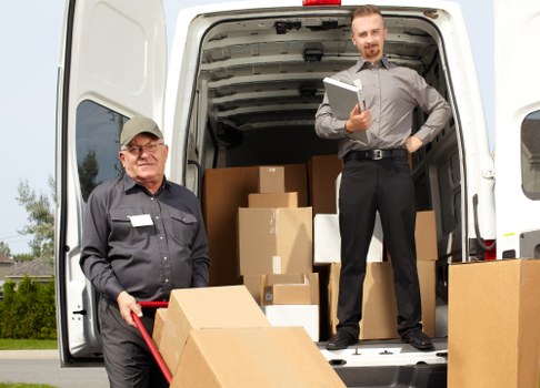 Moving van and packed boxes ready for a service booking