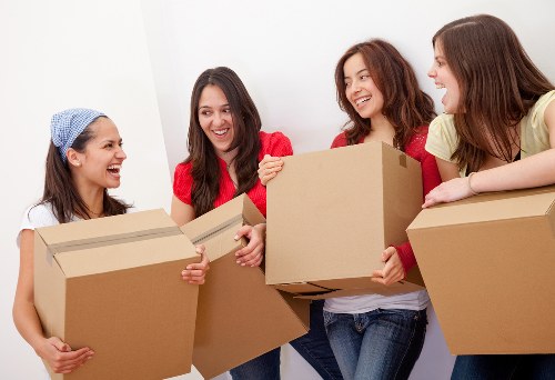 Packed boxes and furniture ready for a local Canary Wharf move