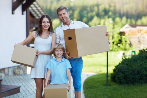Careful room-by-room unpacking in a modern Canary Wharf property