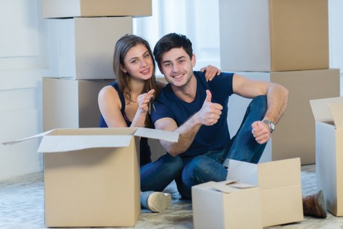 Moving boxes and office items in a Canary Wharf business district move