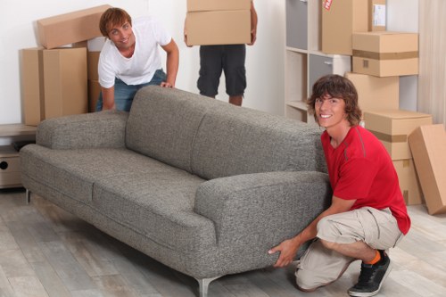 Moving van and crew prepared for a Canary Wharf property move