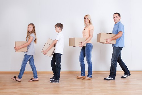 Professional movers supporting a high-rise residential move in Canary Wharf
