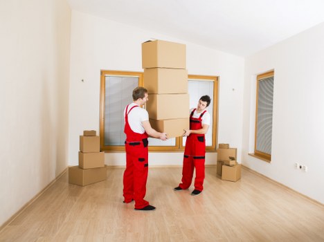 Local moving van serving Canary Wharf office and residential customers