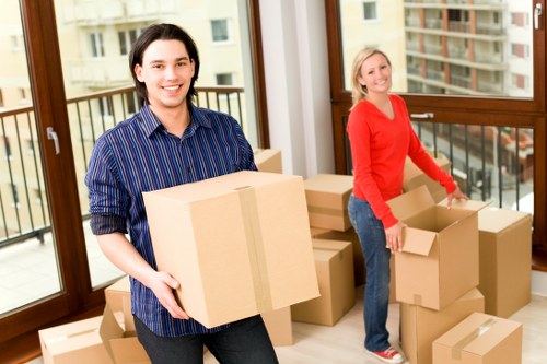 Canary Wharf home moving team navigating apartment access, lifts, and parking
